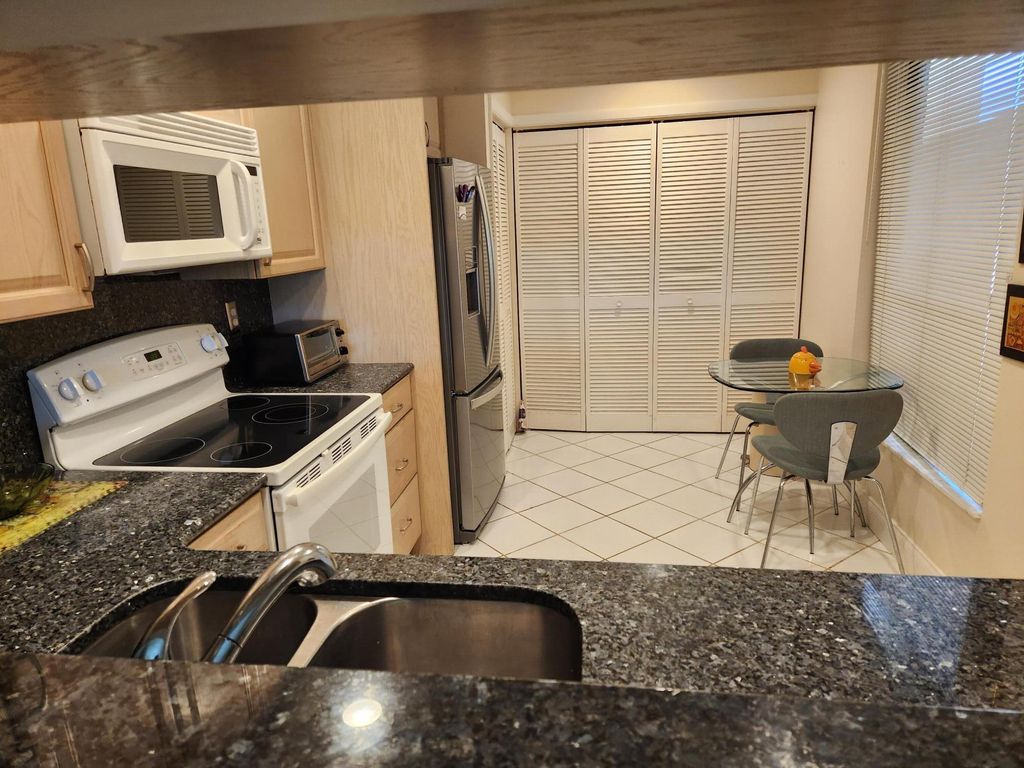 Photo of 7448 La Paz Boulevard #103, Boca Raton, FL 33433 (MLS # R11006430)