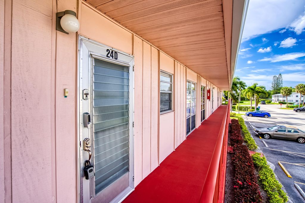 Photo of 24 Golfs Edge #D, West Palm Beach, FL 33417 (MLS # B26015941)