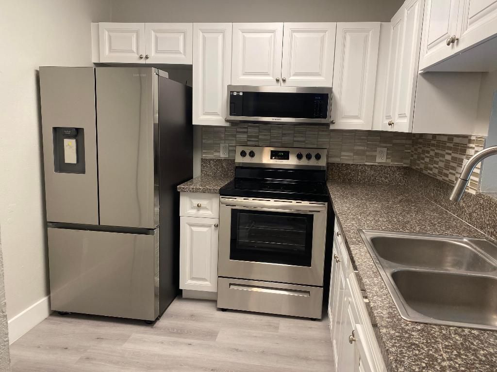 Photo of 11436 NW 43rd Street #1-4, Coral Springs, FL 33065 (MLS # R11150125)