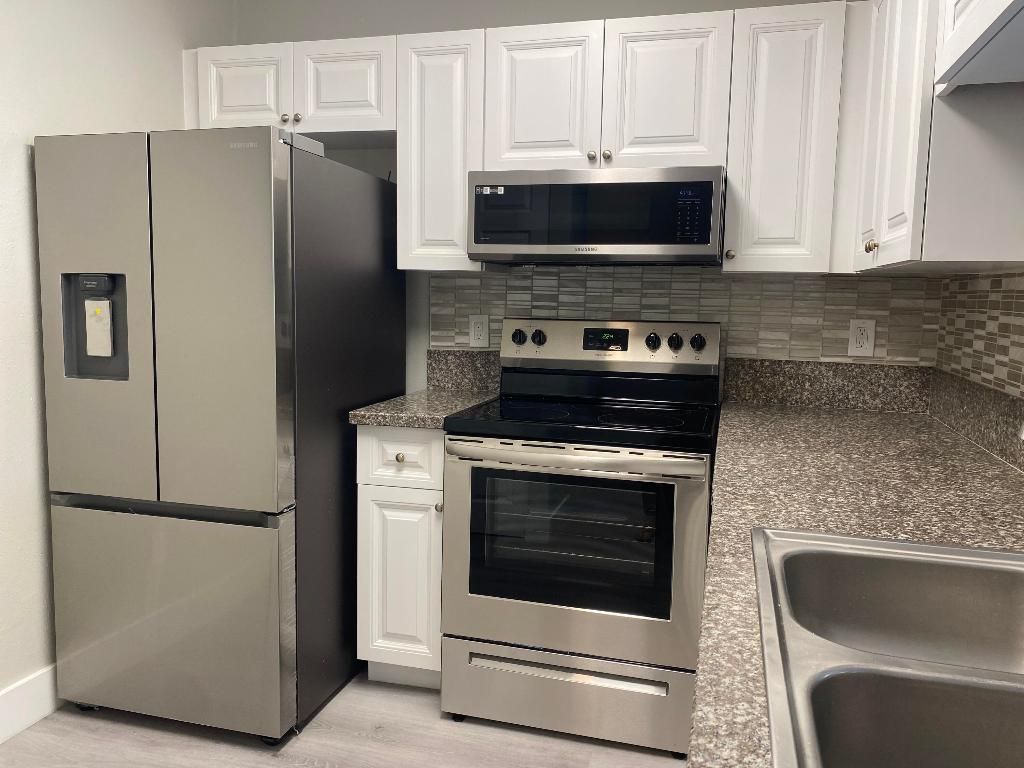 Photo of 11436 NW 43rd Street #1-4, Coral Springs, FL 33065 (MLS # R11150125)