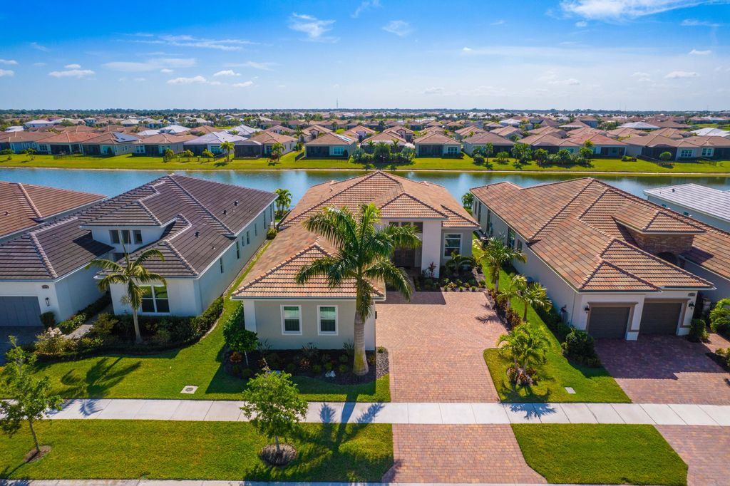 Photo of 8699 SW Flutto Way, Port Saint Lucie, FL 34987 (MLS # R10969297)