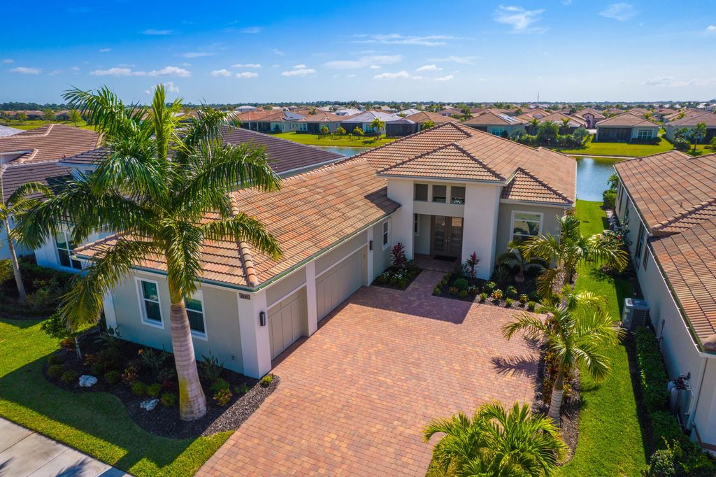 Photo of 8699 SW Flutto Way, Port Saint Lucie, FL 34987 (MLS # R10969297)