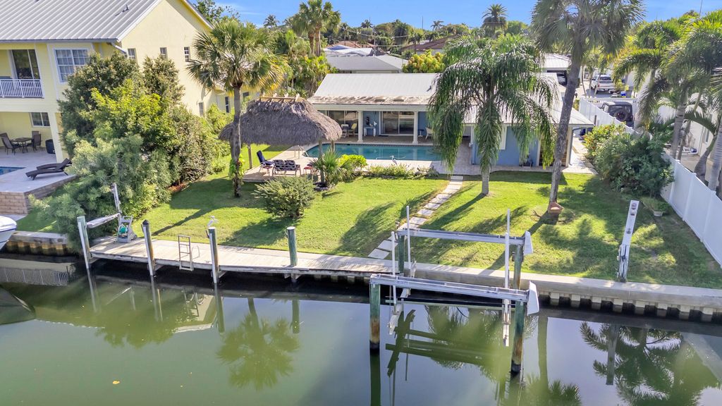 Photo of 910 Dolphin Drive, Jupiter, FL 33458 (MLS # R11077448)