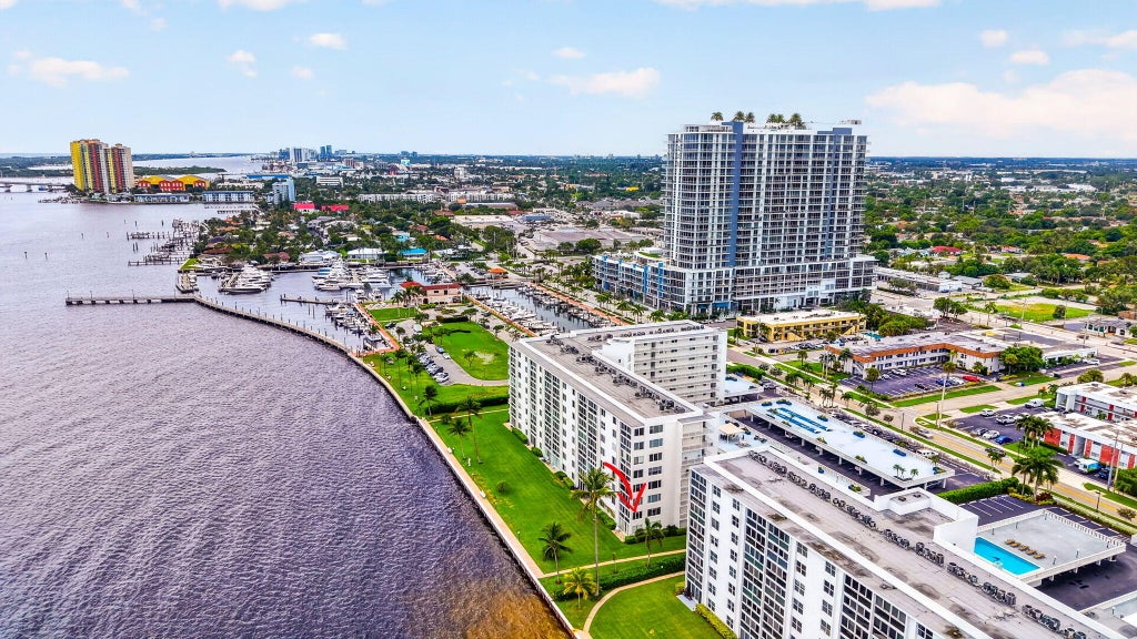 Photo of 301 LAKE SHORE Drive #201, Lake Park, FL 33403 (MLS # B26080751)