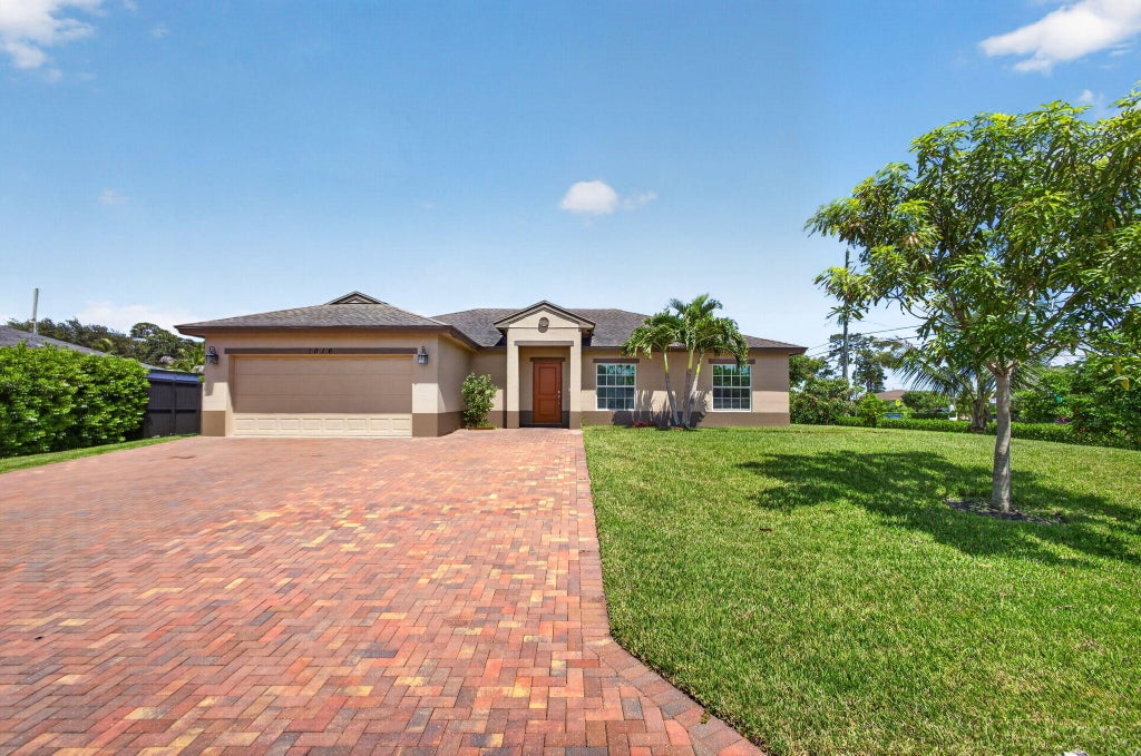 Photo of 1016 CHERYL Road, Haverhill, FL 33417 (MLS # B26064964)