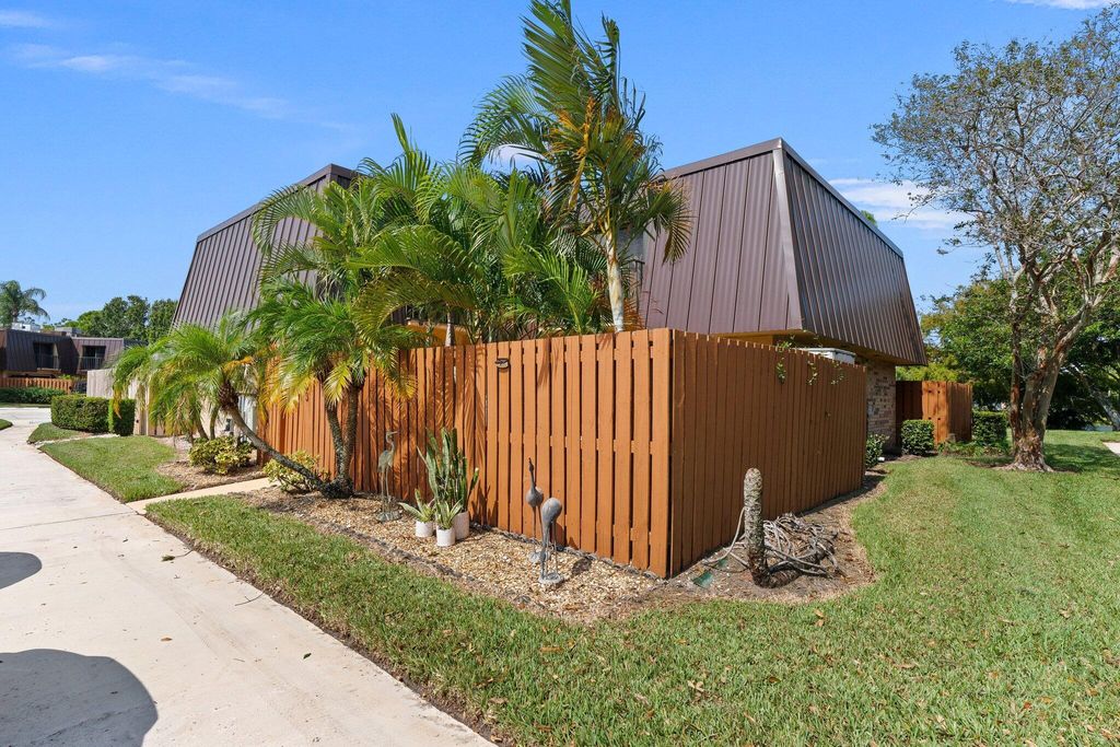 Photo of 6403 SE Windsong Lane, Stuart, FL 34997 (MLS # R11029772)