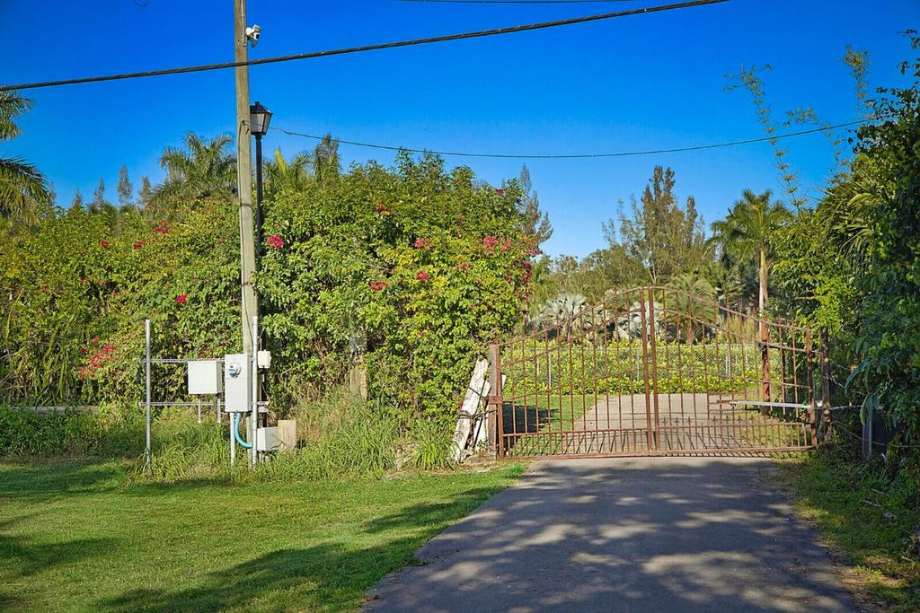 Photo of 3057 D Road, Loxahatchee Groves, FL 33470 (MLS # R11110626)