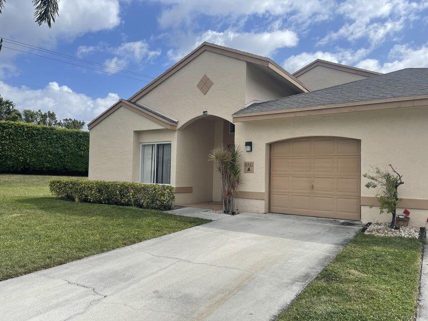 Largest villa model in Boca Gardens 3/2 with garage and screened patio on quiet street. great sized upgraded kitchen and bright spacious floor plan. Volume ceilings add to the feel of great space. Split bedrooms, very large master bedroom with spacious walk in closet. Air conditioned garage. End unit Very quiet area of community. Move in condition. Super clean and well-maintained. Resort like community Boca Gardens has to offer 3 pools, 4 tennis courts, basketball court, tot lot, and tons of green space.