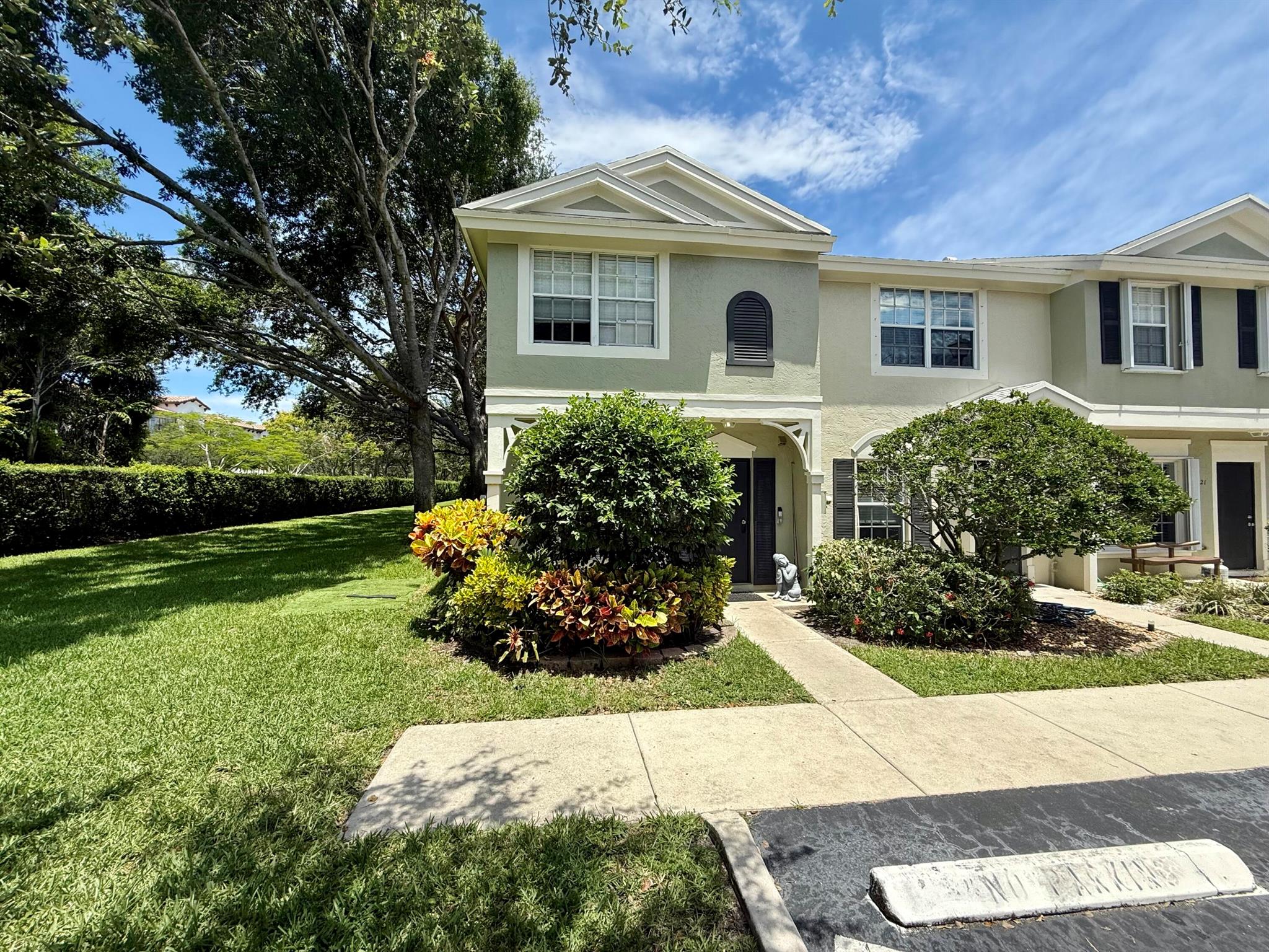 Live the Waterfront Dream at Kokomo Key! Discover Kokomo Key, a gated townhome community offering breathtaking Intracoastal views, lush golf course scenery, and resort-style amenities. This 2BR/2.5BA end-unit townhouse features tile & laminate flooring, an updated kitchen with butcher block & granite counters, a serene garden view with covered patio and a spacious side yard. Enjoy a heated/chilled pool, BBQ park, playground, basketball hoop, and gated boat yard. Stroll the scenic boardwalk, relax in the gazebo, or soak up the sun on the sundeck--all directly on the water. Minutes from US1, beach, dining, and shopping. Move-in ready with quick closing!