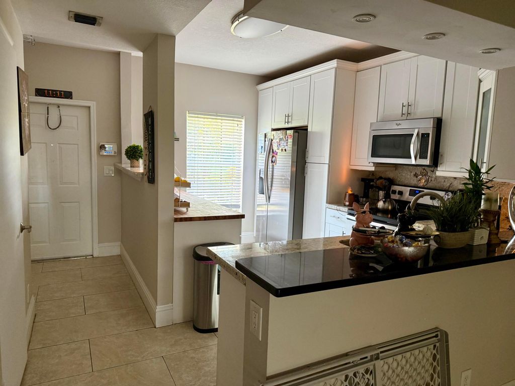 Photo of 825 Kokomo Key Lane, Delray Beach, FL 33483 (MLS # R11110218)