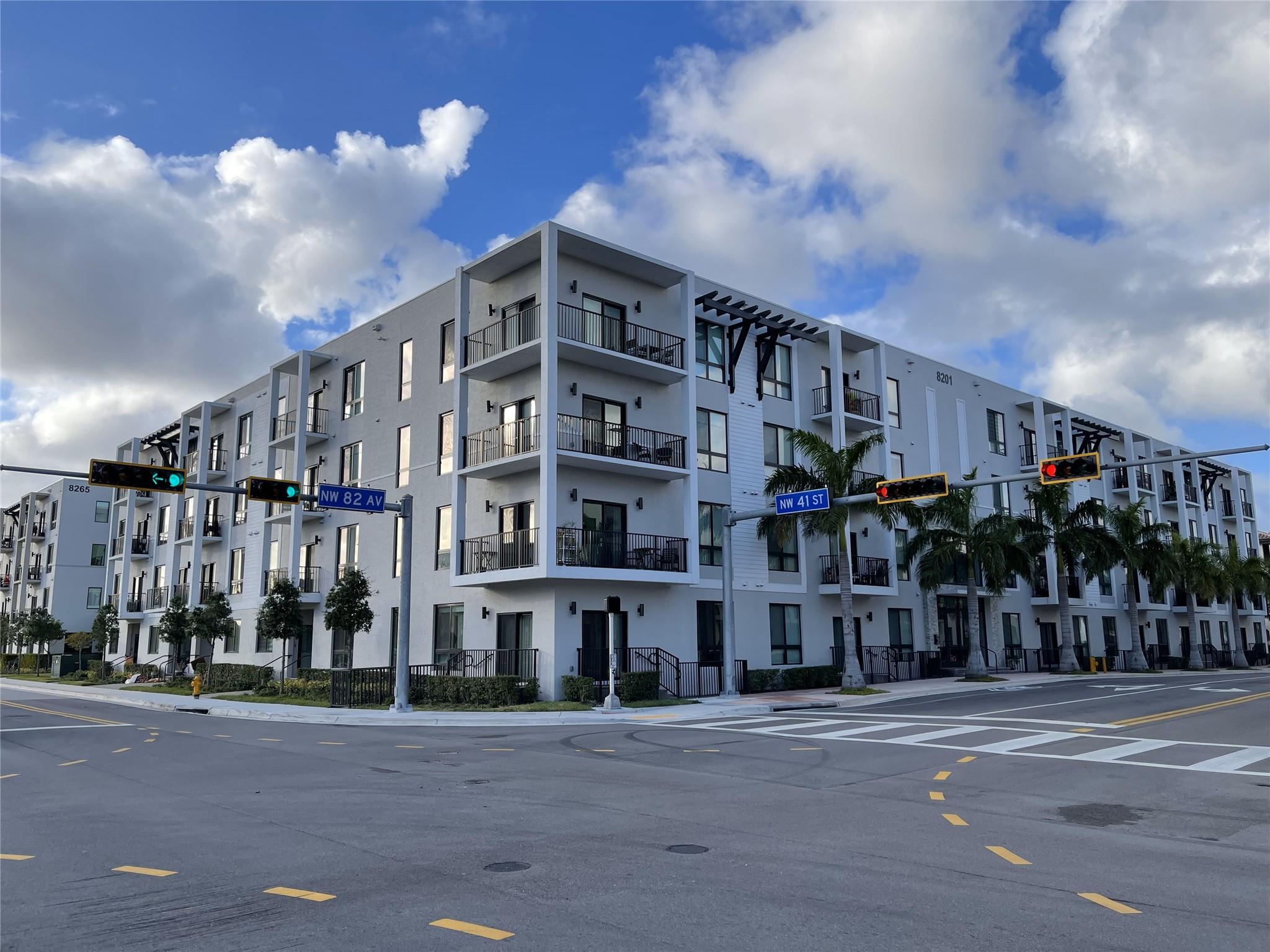 Opportunity at URBANA in Downtown Doral! Experience modern living with superior privacy and protection thanks to soundproof impact windows. This bright 3-bedroom, 2 full bathroom residence features an open-concept layout with spacious interiors, a Split floor plan, a contemporary kitchen with quartz island countertops, and premium stainless steel appliances. Perfect for families and professionals alike, this home offers access to top-rated schools and an active lifestyle. Residents enjoy exclusive access to a state-of-the-art clubhouse with a resort-style pool, fitness center, climate-controlled basketball court, running track, business center, and more. Turn this pet-friendly unit into your next home.