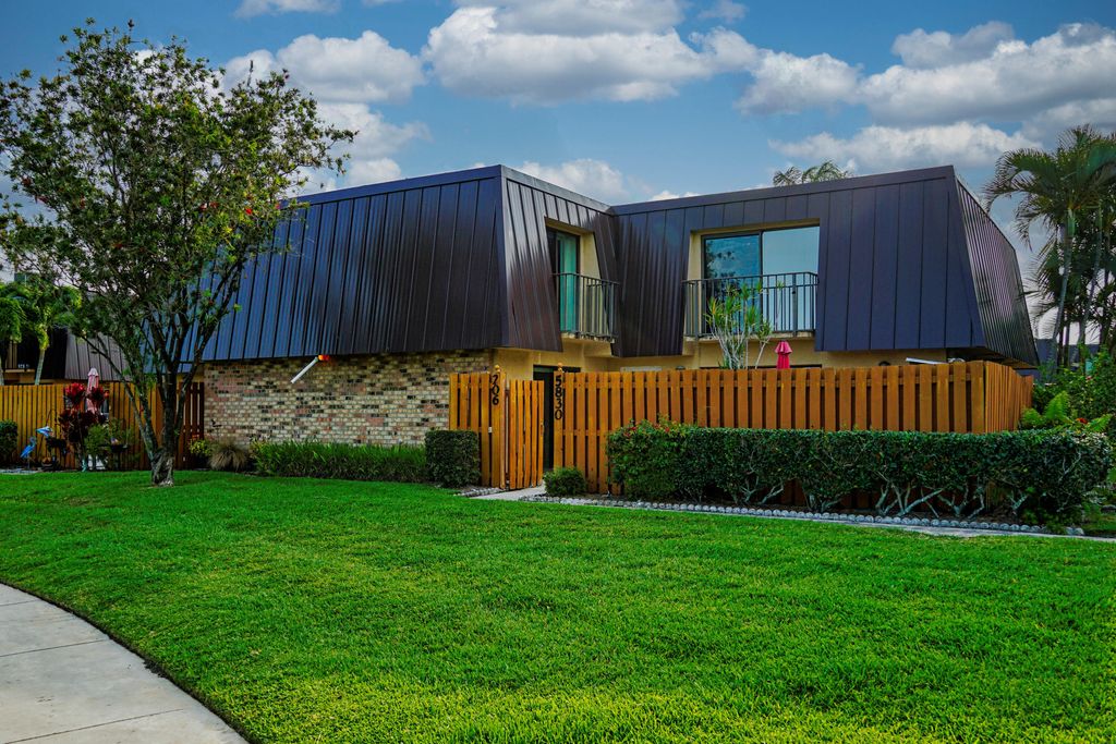 Photo of 5830 SE Windsong Lane, Stuart, FL 34997 (MLS # R10795841)