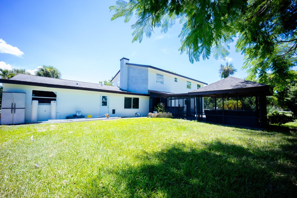 Photo of 9435 EL PASO Drive, Lake Worth, FL 33467 (MLS # B26075489)