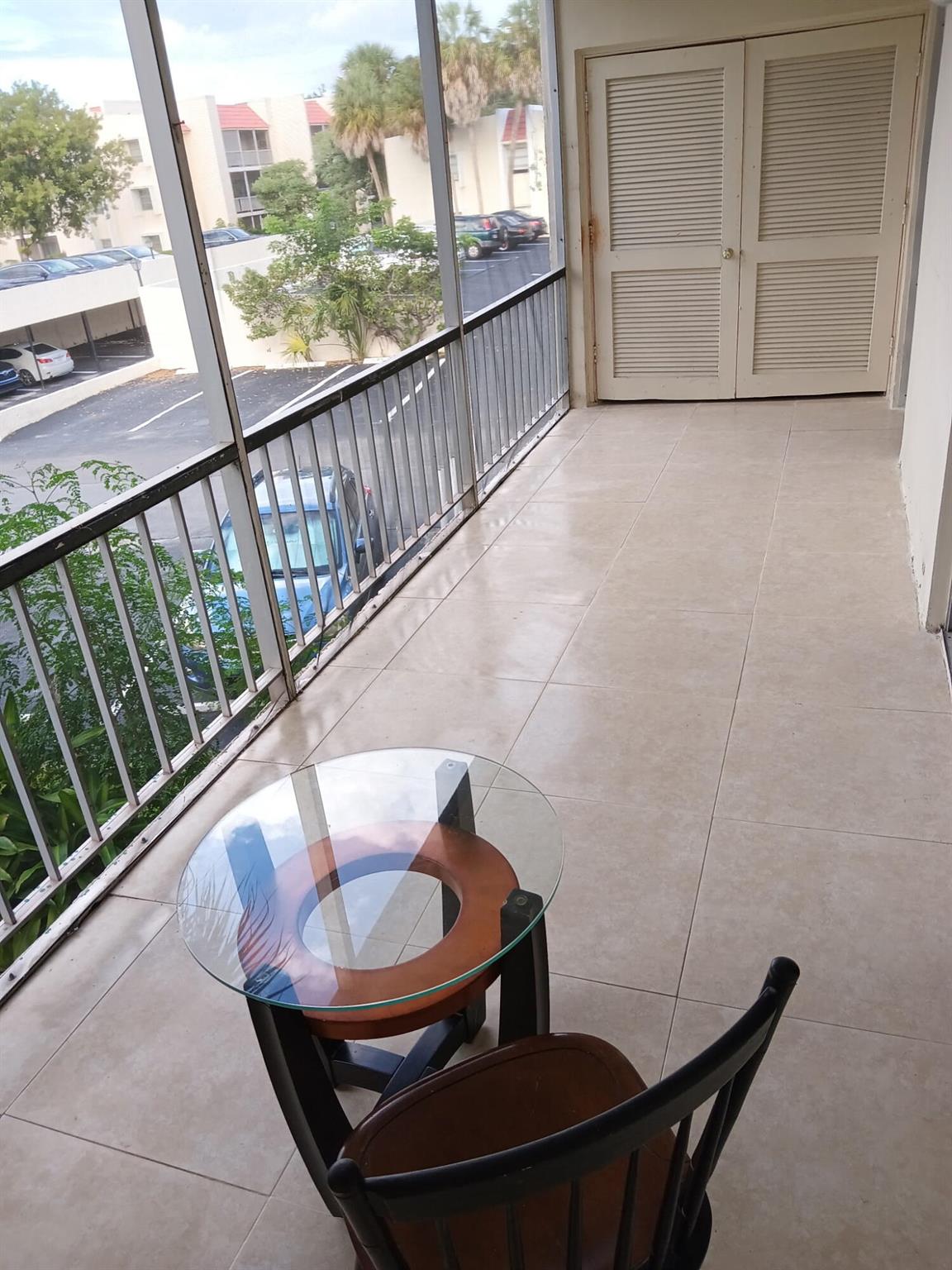 FAST MOVE IN!  Spanish Oaks, across from FAU and adjacent to the Boca Hospital. 2 master suites!!  Nicely renovated 2br/2bth with a large screened in terrace with storage closet.  Washer and dryer on the same floor but not in the unit. Manned Guard gate starts at 5 pm.