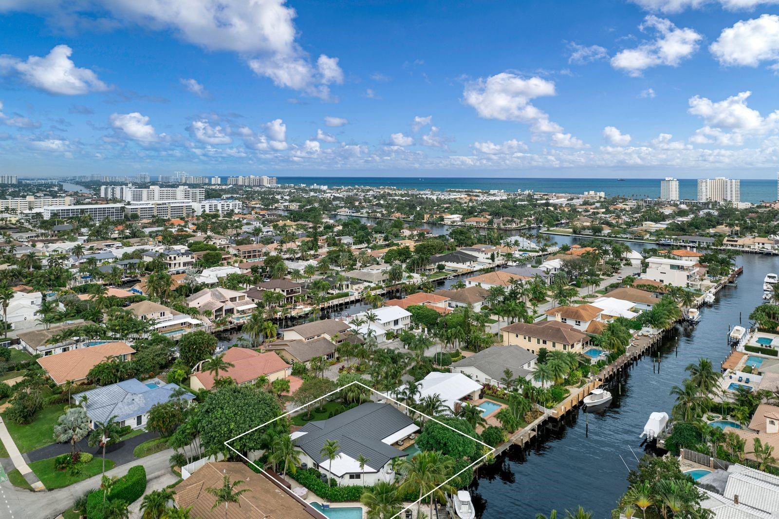 Welcome to your private sanctuary in the prestigious Coral Ridge neighborhood—a luxurious 4-beds, 3.5-bath waterfront estate boasting over 3,000 sq ft of refined living space. Every detail of this meticulously maintained home blends timeless elegance with modern comfort. Step outside to your personal paradise featuring a heated saltwater pool, outdoor bar, and panoramic water views—ideal for entertaining or serene relaxation. Inside, enjoy spacious interiors, abundant storage, a master suite that offers tranquil water vistas and pure indulgence, and a full-house generator. Located within walking distance to the Coral Ridge Country Club, you’ll have easy access to world-class golf, fine dining, and social events. This isn’t just a home—it’s a lifestyle of luxury, leisure, and distinction.