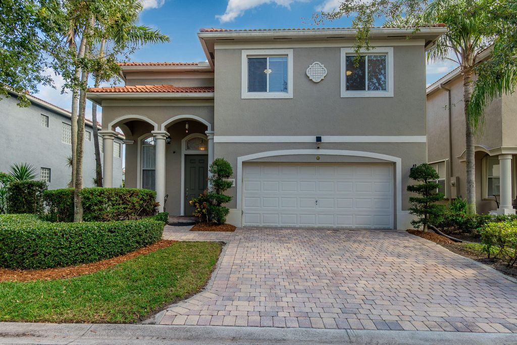 Photo of 1004 Center Stone Lane, Riviera Beach, FL 33404 (MLS # R11151554)