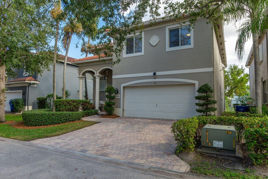 Photo of 1004 Center Stone Lane, Riviera Beach, FL 33404 (MLS # R11151554)