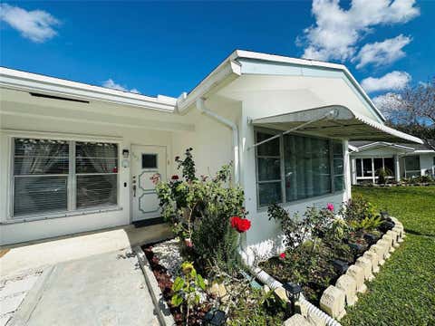 Photo of 8431 NW 12th Street #D68, Plantation, FL 33322 (MLS # B26036961)