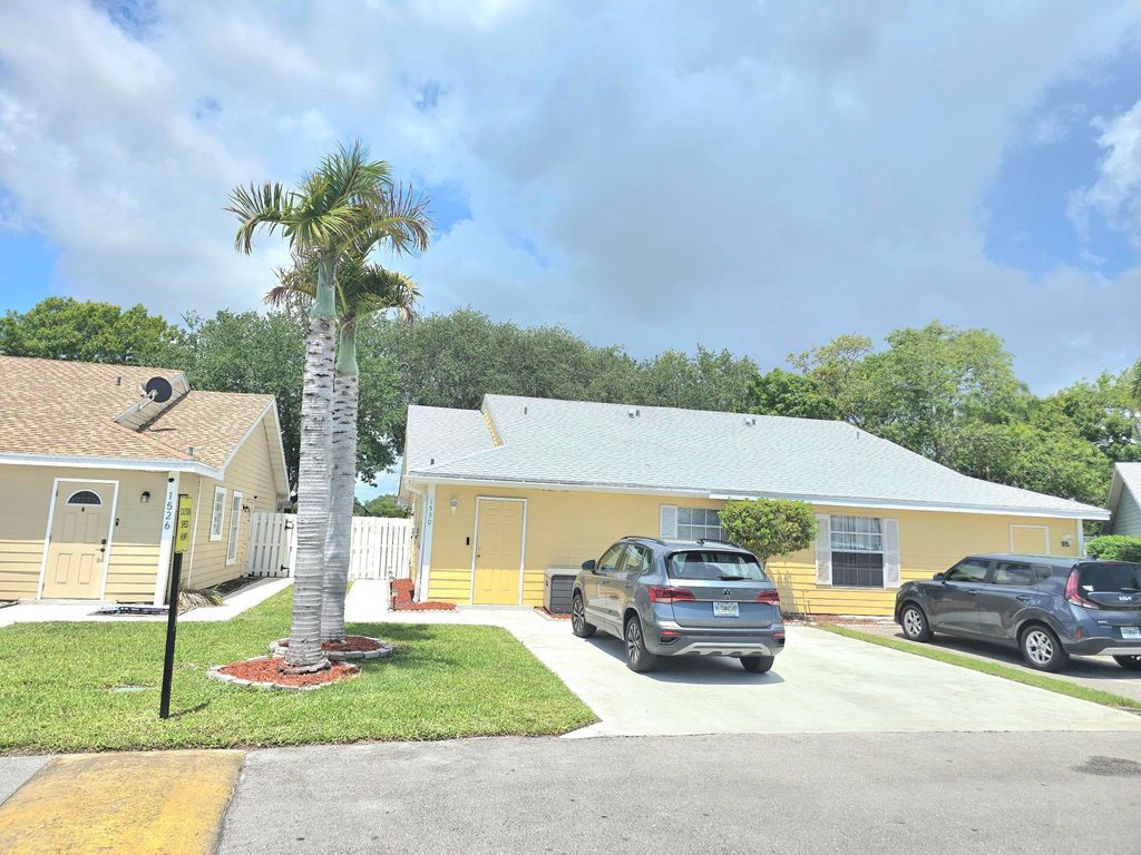 Photo of 1530 Royal Forest Court, West Palm Beach, FL 33406 (MLS # B26026982)