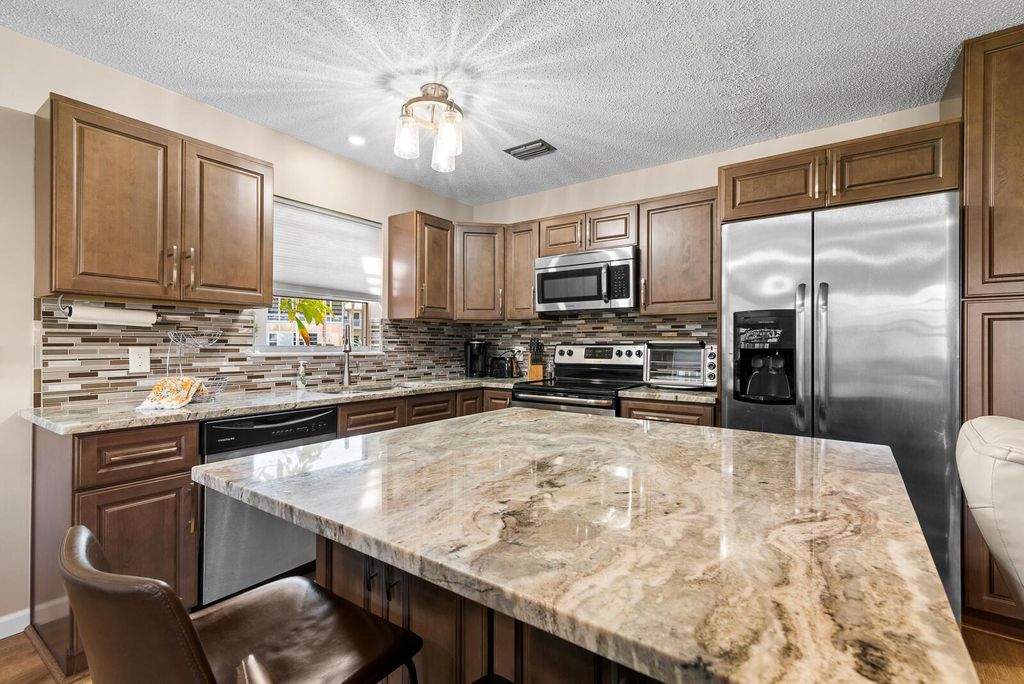 Photo of 22 Lake Vista Trail #103, Port Saint Lucie, FL 34952 (MLS # R10965678)