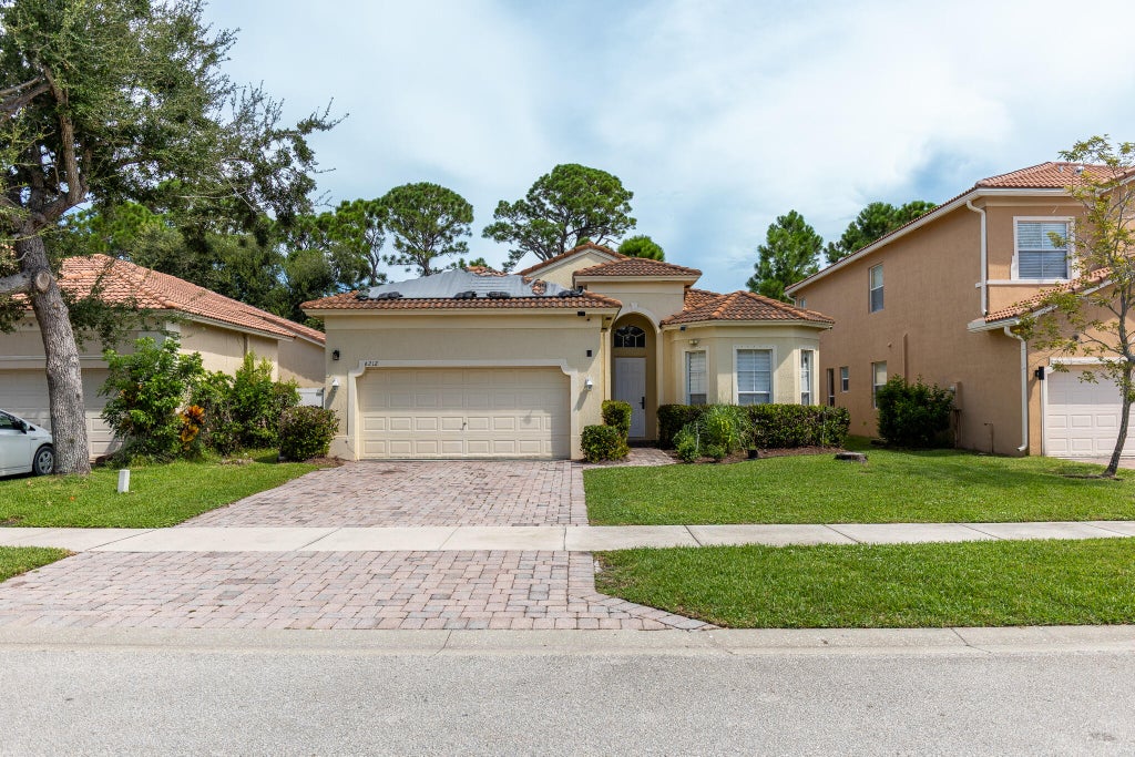 Photo of 6212 Spring Lake Terrace, Fort Pierce, FL 34951 (MLS # B26073091)
