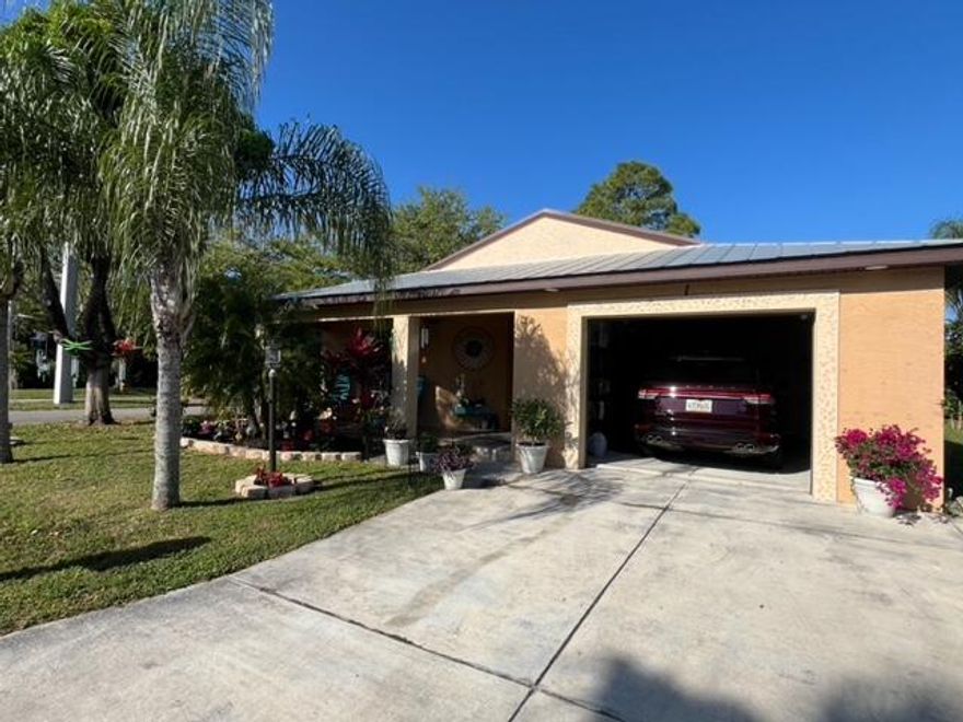 PROPERTY OFFERS PEACE AND TRANQUILITY NEARBY BEACHES, GROCERY STORES, MEDICAL FACILITIES, YOU HAVE FOUND THE RESORT STYLE LIVING. VAULTED CEILING, IMPACT WINDOWS, COMPLETE GLASS ENCLOSED PATIO, CALIFORNIA WINDOW TREATMENT, NEW LAMINATE IN BEDROOMS. METAL ROOF, TILED FRONT ENTRYWAY.