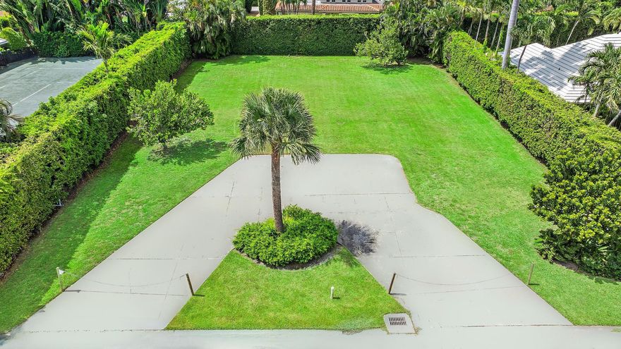 254 N Woods Road presents a rare opportunity to build your dream home in Palm Beach. This oversized 100' x 150' vacant lot offers an exceptional location just steps from the scenic Lake Trail. Whether you're envisioning a classic Palm Beach estate or a modern coastal retreat, this property provides the perfect canvas. Enjoy the tranquility of this quiet street living with close proximity to beaches, shopping, and dining. A true opportunity for those seeking to create a custom lifestyle in one of the island's most desirable neighborhoods.