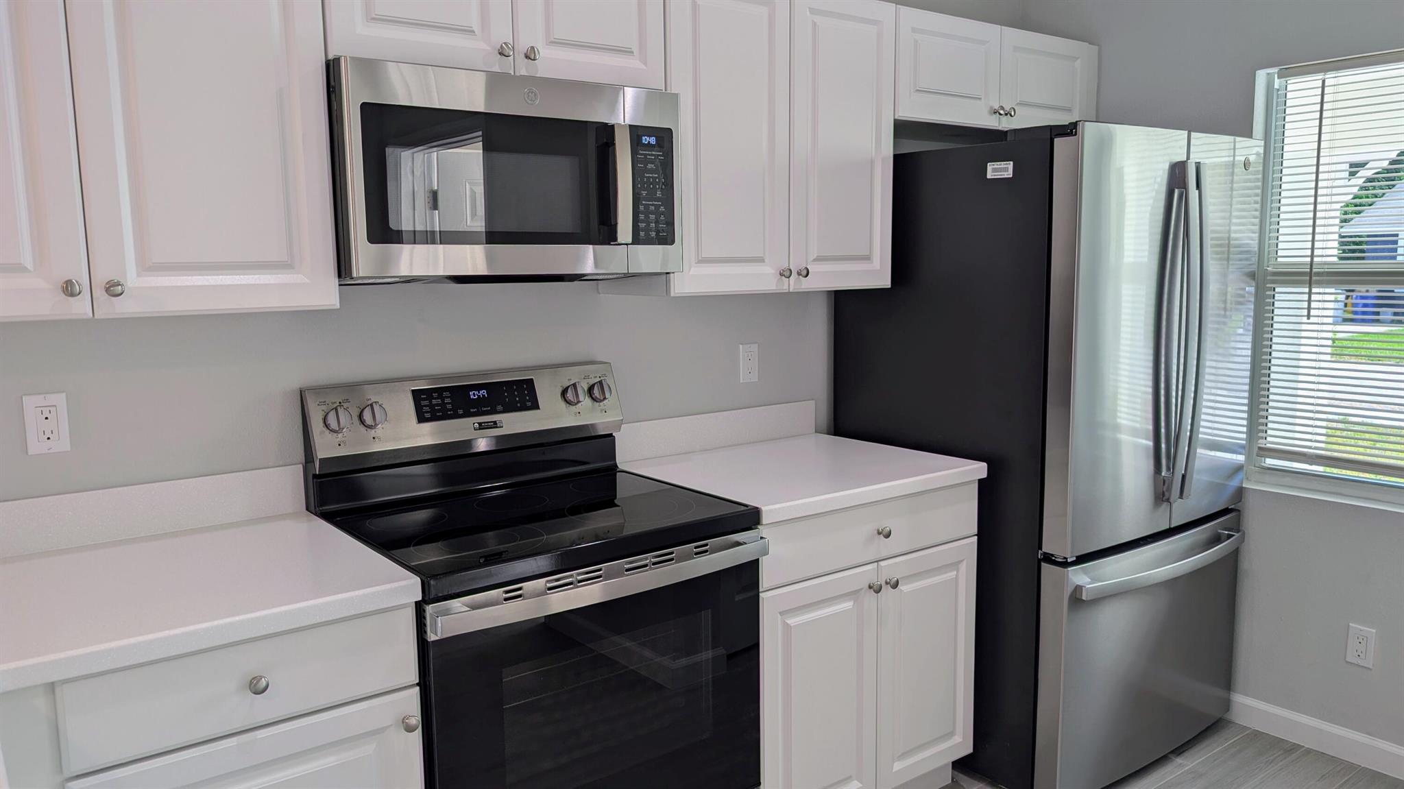 Excellent New Opportunity! Discover this Newly Built Concrete Block Home with ''FULL'' Impact Glass Windows & Rear Slider! - Perfect for Energy Efficiency PLUS+ New GE Stainless Steel Appliances, Corian Countertops, White Kitchen Cabinetry, Whirlpool Washer/Dryer ++ Ceramic Tile Flooring throughout. Landscaping is included and the Home is on City Water. In addition there is the 253 SQ FT attached Garage & a 160 Sq Ft Covered Entrance Lanai- a perfect place for relaxing. NO HOA! Truck/s, Motorcycle & Pet Friendly Too!! Close to Top-Rated Martin County Schools & quick to Shopping, Dining & the Port Salerno Waterfront District.