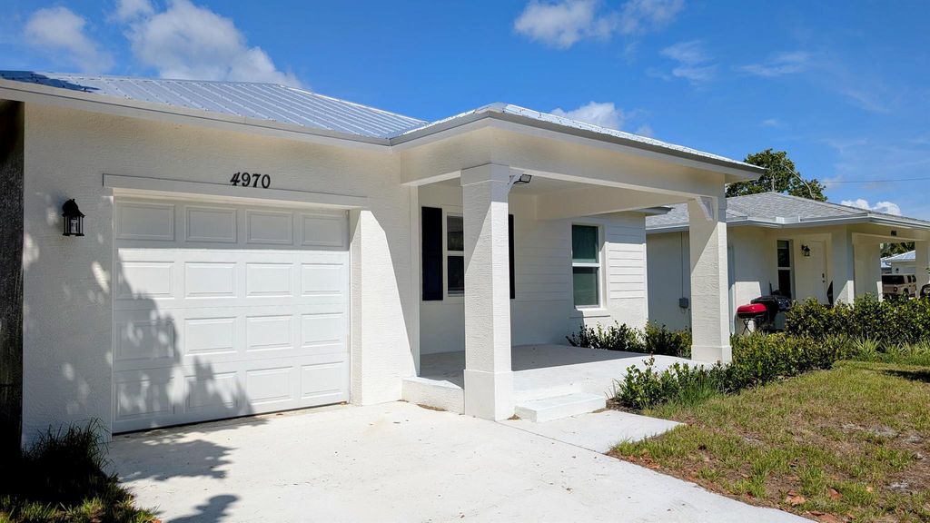 Photo of 4970 SE Jack Avenue, Stuart, FL 34997 (MLS # R11100604)