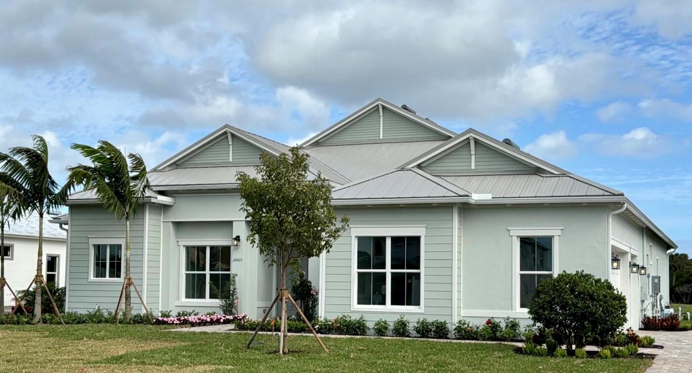 BRAND NEW construction in Jupiter without the long wait! This single-story Oakley home is ready for immediate move in and situated on a 1.08 acre lake homesite. Price Includes ALL Designer selected Finishes in this Beautiful Open concept home with impressive High Ceilings. Also Included is the zero-corner slider, bringing the outdoors, inside. Loads of natural light. Gourmet kitchen Boasts a Chef style Kitchen Aide Appliance package. Bridgewater's prime Jupiter location is just 5 miles to the beach, surrounded by world-class golf, boating, fishing, shopping, hiking and biking trails, EZ access to highways and PBIA. Builder's Model home available to tour onsite.
