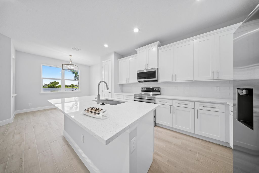 Photo of 1373 SW Gastador Avenue, Port Saint Lucie, FL 34953 (MLS # R11162976)