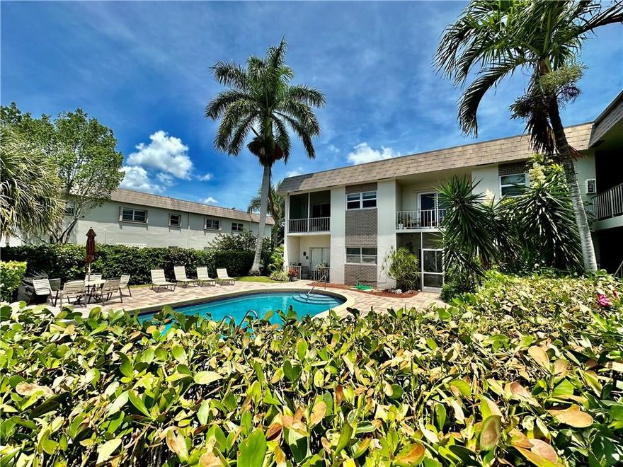 Pool view 2 bed / 1 bath corner top floor condo in great area of Oakland Park. Updated unit with impact windows, tile flooring, fresh paint, open kitchen layout with granite counter tops and stainless appliances. Newer AC and tankless water heater. Peaceful screened balcony over looking pool. Small, pet friendly community. Laundry right next to unit. Easy access to Wilton Manors, US 1, and downtown Oakland Park Arts District / Funky Buddha.