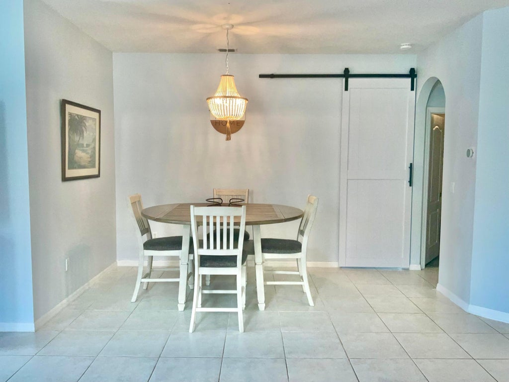 Photo of 10014 SW CHADWICK Drive, Port Saint Lucie, FL 34987 (MLS # B26082333)