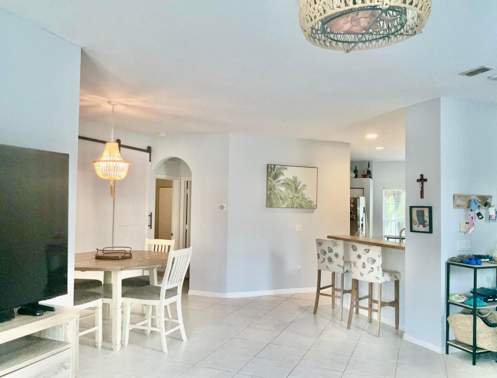 Photo of 10014 SW CHADWICK Drive, Port Saint Lucie, FL 34987 (MLS # B26082333)