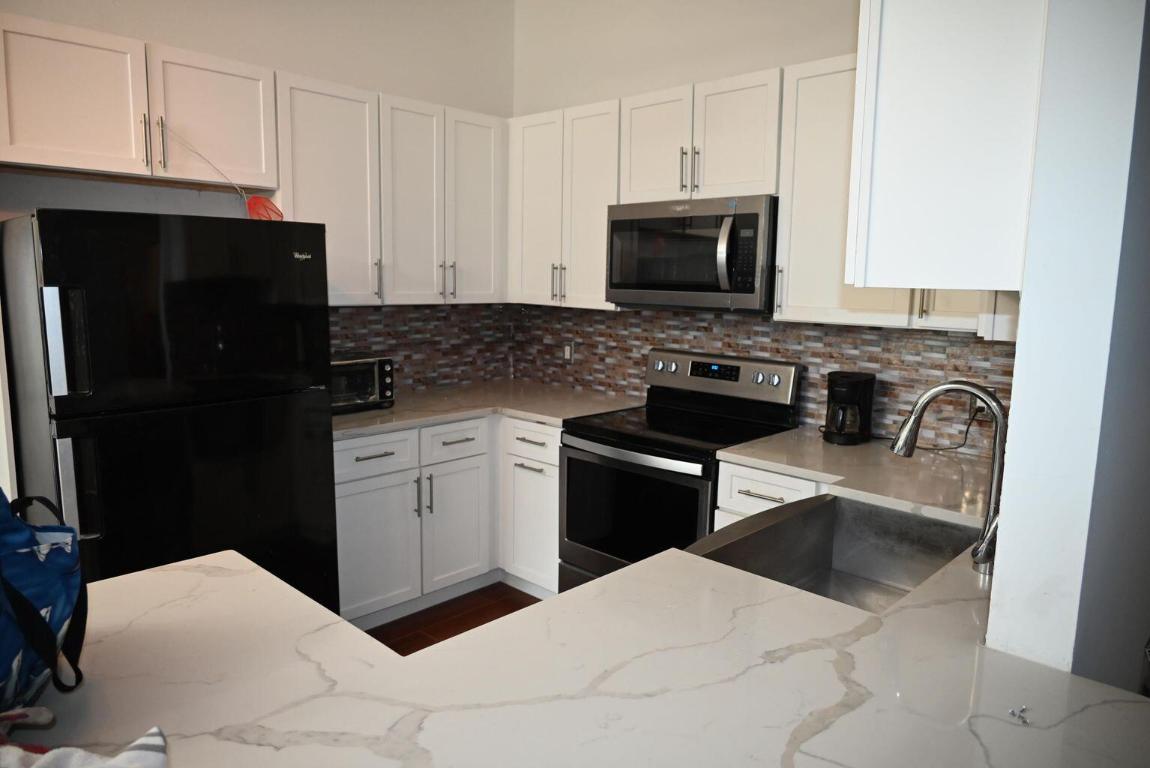 SUGAR POND MANOR OF WELLINGTON - Residential