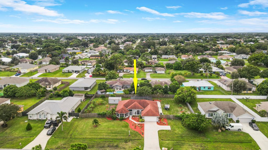 Photo of 1358 SW Del Rio Boulevard, Port Saint Lucie, FL 34953 (MLS # R11135603)