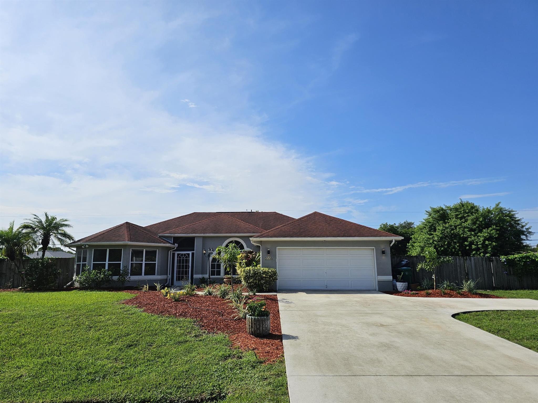 This meticulously well-maintained 3bdr/2ba saltwater pool home has a spacious open floor plan with numerous upgrades throughout. The kitchen has pass thru windows to the covered and screened pool area and enjoys new SS dishwasher, range and microwave. The interior of home is freshly painted with all new rectangular tile floors throughout and both bathrooms have been tastefully upgraded. The A/C unit is 2 years new, HWH 1 year new and pool saltwater system 2 years new. Bring all your Toys as this cutie sits on a nearly 1/2 acre fenced lot with shed and electric. Owner has been transferred and will entertain all reasonable offers. More photos coming​​‌​​​​‌​‌​​​‌‌​​​‌‌‌​​‌​​‌‌​​​​ soon!!
