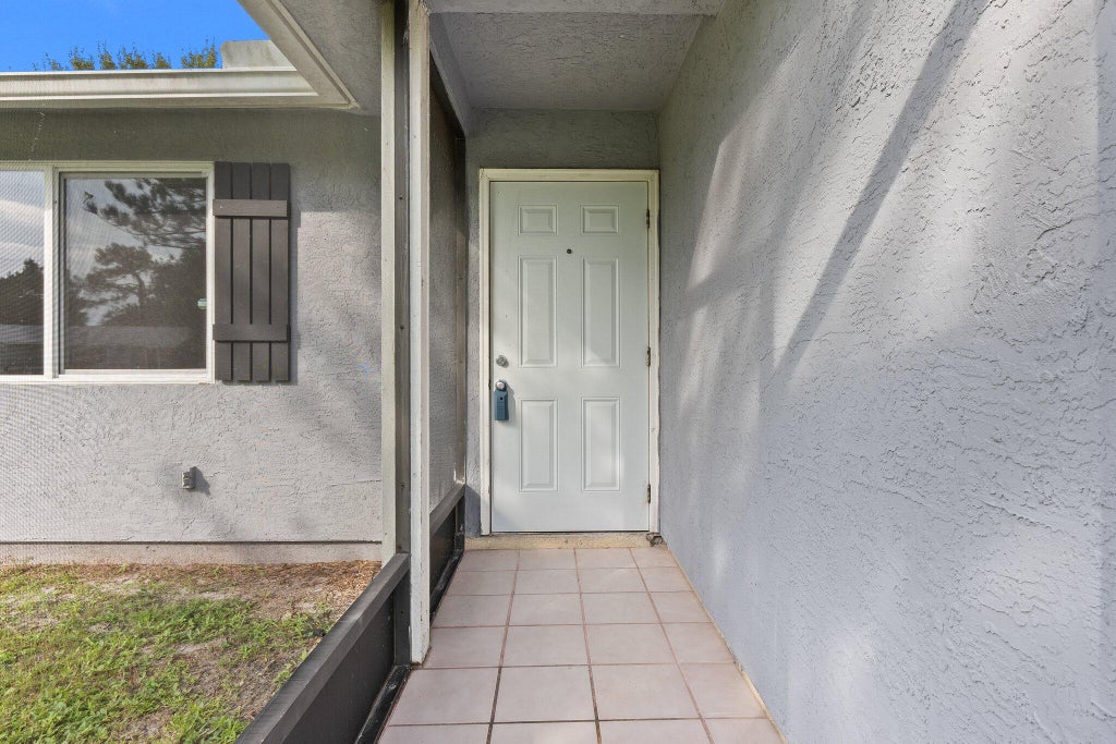 Photo of 1610 SW Buffum Lane, Port Saint Lucie, FL 34984 (MLS # R11023618)