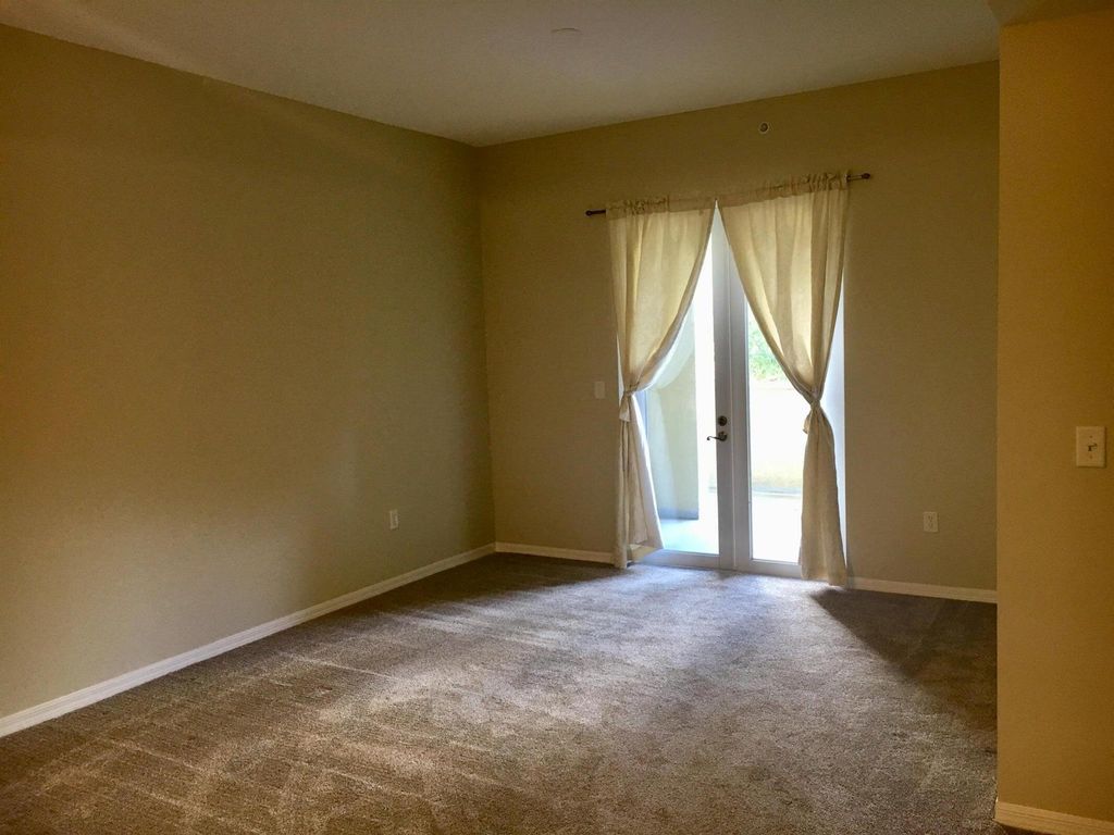 Photo of 1203 Town Center Drive #219, Jupiter, FL 33458 (MLS # R11030189)