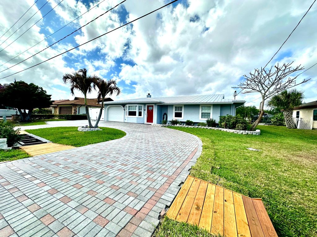 Photo of 141 NE Sagamore Terrace, Port Saint Lucie, FL 34983 (MLS # B26008980)