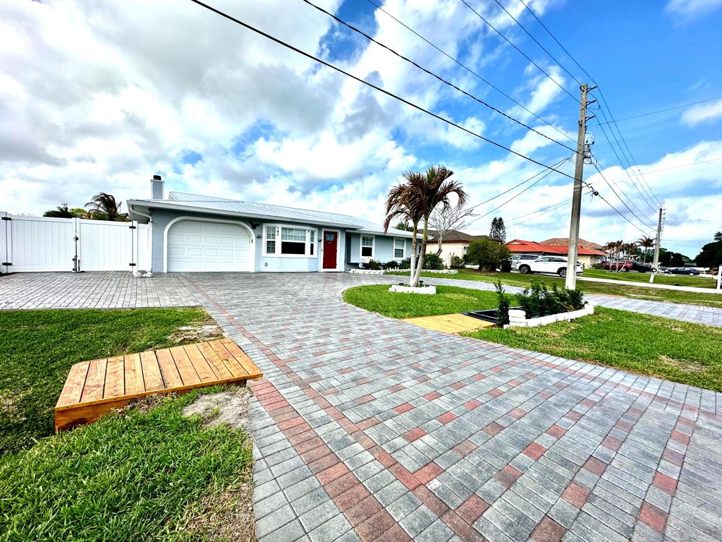 Photo of 141 NE Sagamore Terrace, Port Saint Lucie, FL 34983 (MLS # B26008980)