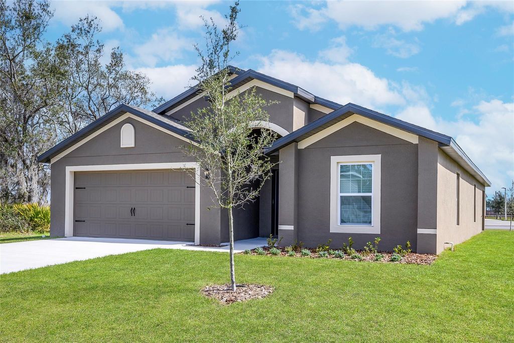 Photo of 1299 SW Heather Street, Port Saint Lucie, FL 34983 (MLS # F10427657)