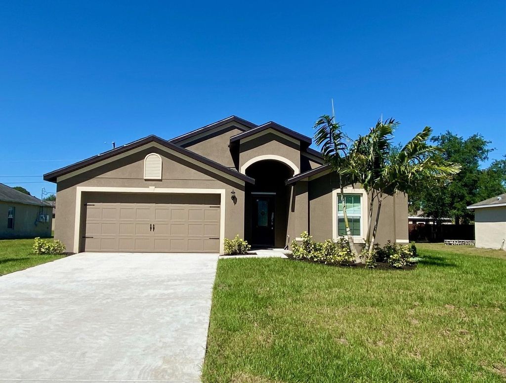 Photo of 1299 SW Heather Street, Port Saint Lucie, FL 34983 (MLS # F10427657)