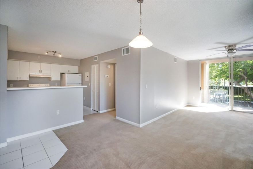 Coconut Creek: Beautiful 1BD/1BA CORNER UNIT available in the highly desirable Gated Community: Carrington at Coconut Creek! This second-floor condo offers an open layout with a private balcony, in-unit washer & dryer, and hurricane shutters for peace of mind. Water is included in the rent, and the community requires only a 640 credit score. Enjoy resort-style living with amenities including a gym, tennis, racquetball, pool, clubhouse, kids playroom, and more. Tons of guest parking right outside the building. Located near top-rated schools, shopping, and major highways—plus you can walk to the Promenade for dining and entertainment. Video Tour Available. Schedule your showing today!