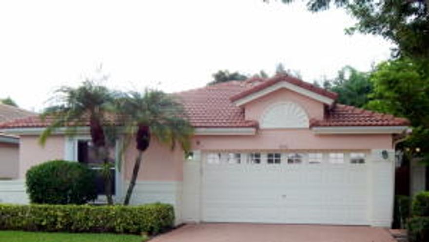 Great buy in Palm Isles.  Large open floor plan with flexible living spaces.  3 bedrooms, one used as a den. 3rd bedroom has built in shelves perfect for office or study use.  Kitchen offers convenient pass through to dining room and large enough for an eat in area.  Appliances are 2 years new, A/C is one year new, Water heater is 3 years new.  Other features of this lovely home include crown molding and tile flooring throughout, accordion hurricane shutters for added convenience, and a large screened in back patio.  Palm Isles offers resort style living that includes indoor and outdoor pools, tennis courts, a theater, card rooms, fitness center, billiard room, and much more.....