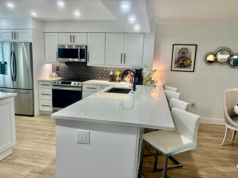 Photo of 5778 Crystal Shores Drive #303, Boynton Beach, FL 33437 (MLS # B26034878)