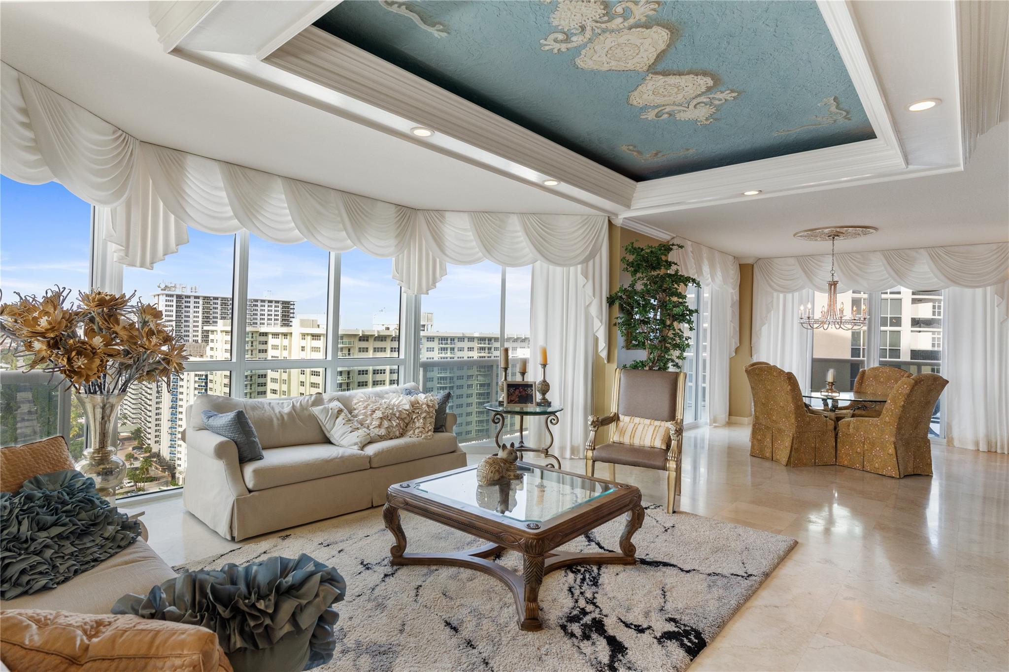 DOUBLE CORNER with PANORAMIC VIEWS of ocean, city & waterway. Two huge wrap-around terraces, Open kitchen, built in bar, marble floors & private elevator. NOTE that 3rd bedroom is open as a den, a wall can easily be
constructed. RESORT-LIKE living w poolside restaurant, 2 clay (har-tru) tennis courts, tennis pro, concierge, private beach pavilion w tiki huts / BBQ/ beach attendant & cabanas, valet PLUS 2 SELF PARKING SPACES in garage (one has an electric charger) 2 pools, 2 spas, toddler pool and PET park. TWO PETS, ANY SIZE, OK.