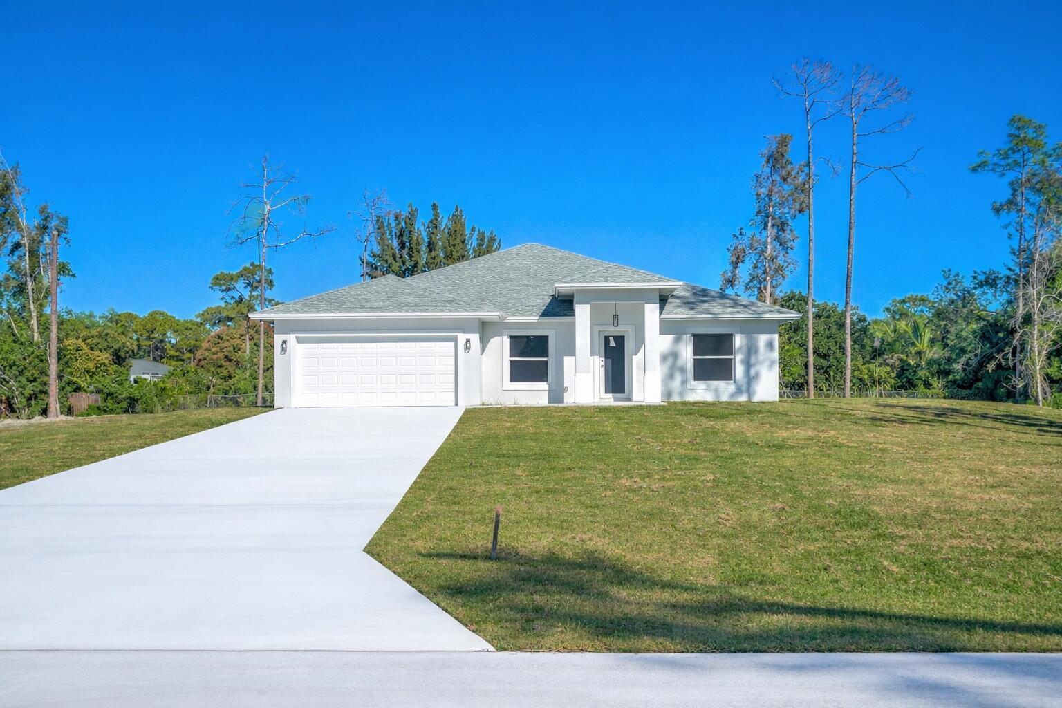 Photo 1 of 70 — 13875 63rd Lane N, The Acreage, FL 33470