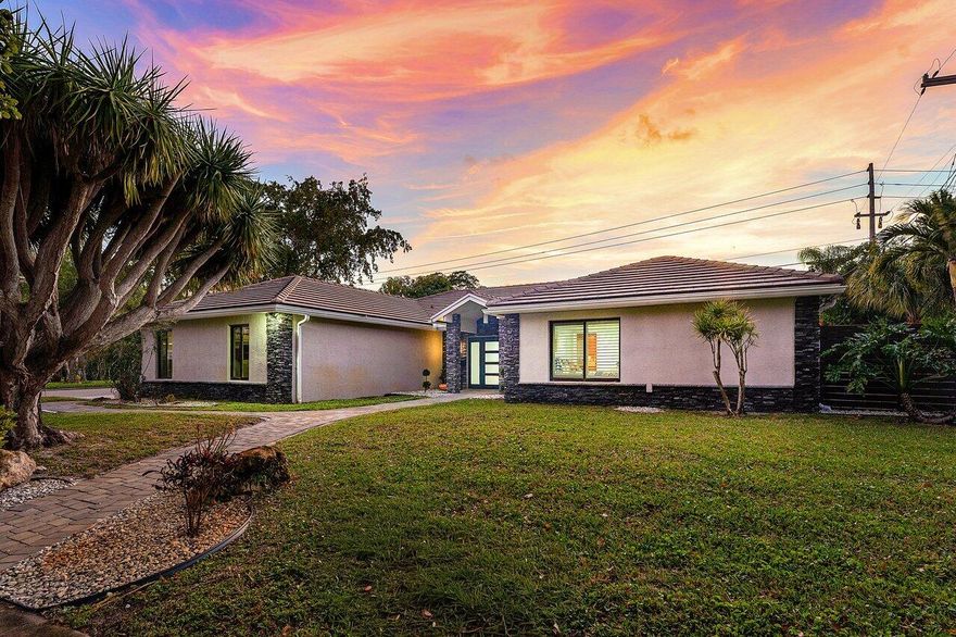 The exterior was redesigned with a refreshed façade, remodeled pool, new pavers, updated fencing, and a custom faux-finish garage door. 

Inside, added living space, tile flooring, crown molding, oversized baseboards, and a custom TV enclosure create a warm modern, inviting feel! 

Hurricane-impact windows, doors, and garage door provide full storm protection, pairing peace of mind with everyday comfort.

Major upgrades include epoxy-lined water lines and a full home generator with a dedicated gas line already installed & a central vacuum system installed in the home. 

Refer to the Documents section for a full list of upgrades, renovations, and improvements.

Recently appraised, adding an extra layer of reassurance.