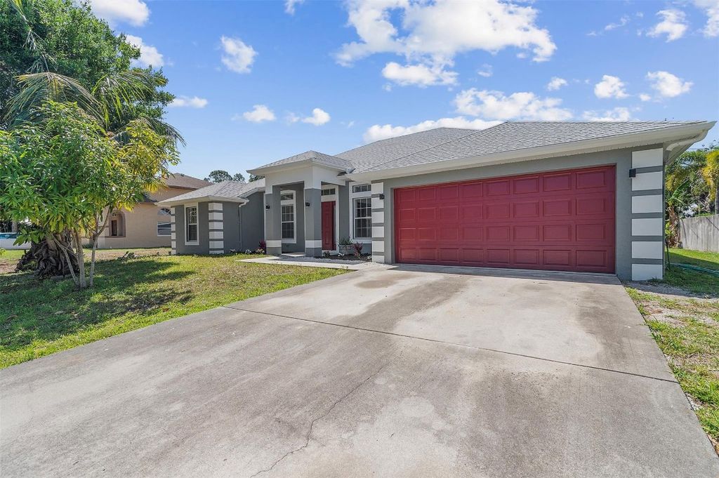 Photo of 1218 SW Melrose Avenue, Port Saint Lucie, FL 34953 (MLS # F10498767)
